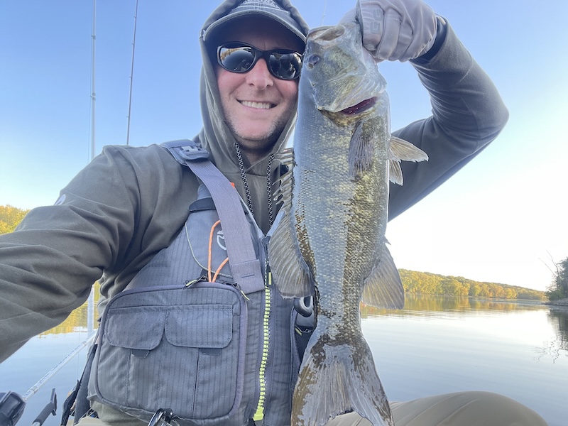 Dive Otter Outfitters founder Tyler Allison fishing from a kayak